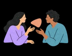 Two teammates talking through their shared results